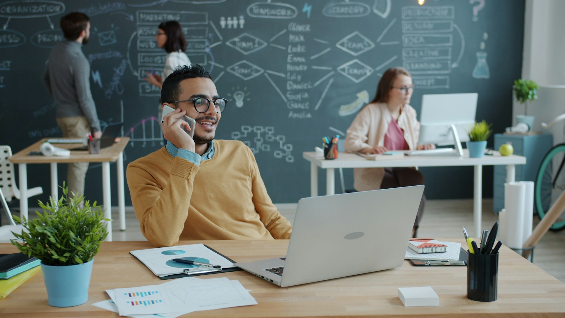 Sales professional speaking with a customer on the phone